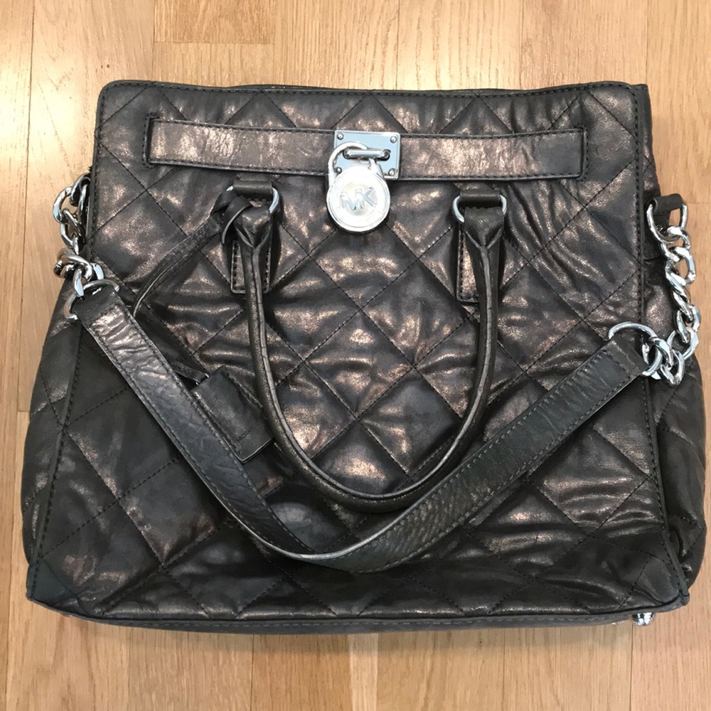 Michael Kors large shimmer gray quilted handbag.